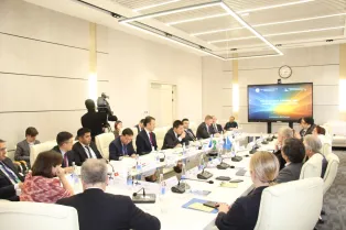 people sitting by the round table